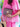 Person holding a mulberry metallic handbag from Elyse & i called Otis
with a pink outfit and straw hat in the background
