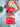Person holding two red Elyse & i handbags with a colorful dress in the background