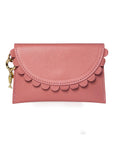 Pink wallet by Elyse & i with scalloped edge design on a white background