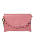 Pink wallet by Elyse & i with scalloped edge design on a white background
