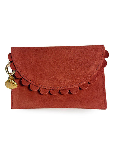 Red Bella Scallop by Elyse & i clutch purse with scalloped edge and gold heart charm on a white background