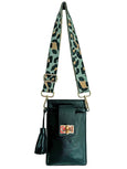 Black Luna lock handbag with a leopard print strap on a white background
