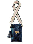 navy python print Luna Lock phone bag by Elyse & i with a striped strap on a white background