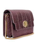 Mulberry metallic leather bag called Otis by brand Elyse & i with a gold chain and clasp on a white background