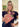 Woman holding a pink Elyse & i
handbag with a floral ribbon, indoors.