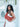 Woman holding a brown Elyse & i Martha hobo bag with a white background