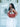 Woman holding a terracotta Elyse & i Martha hobo handbag against a light blue wall