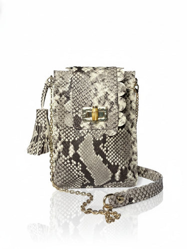 Snake print handbag with chain strap on a white background