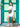 Woman holding a green handbag in front of a teal door