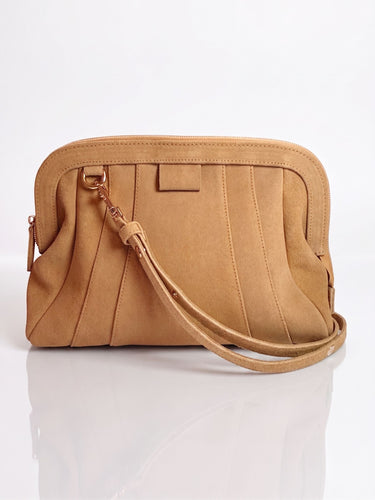 Biscuit brown suede doctor shape bag with strap and panels.  by Elyse & i 
