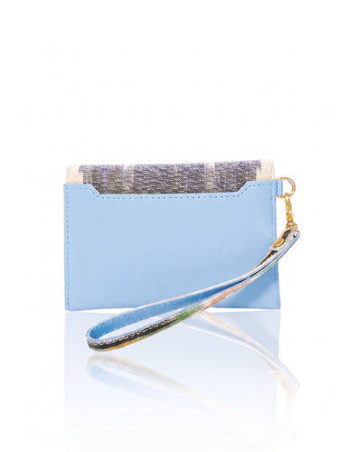 Light blue wristlet with gold accents on a white background