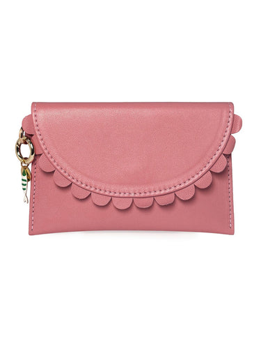 Pink wallet by Elyse & i with scalloped edge design on a white background