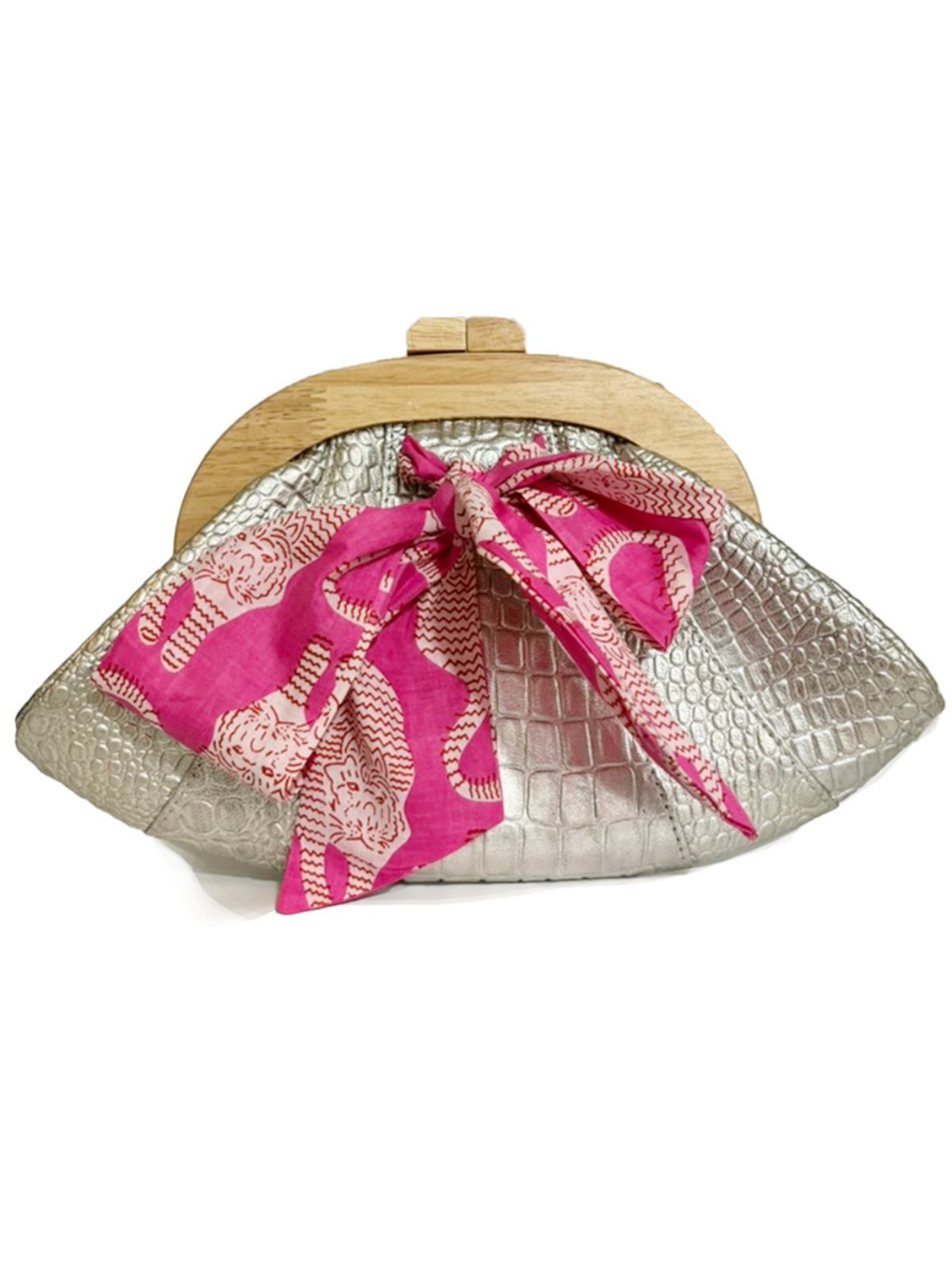 Clutch bag with pink bow and metallic finish on a white background - the Dawn Scallop by Elyse & i in silver croc embossed leather