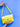 Yellow Finn Elyse & i handbag held by hands against a blue background