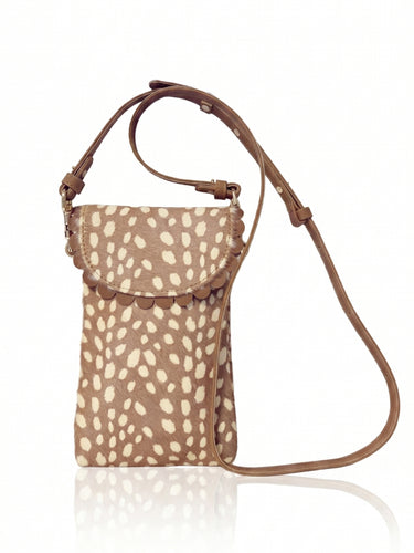 Small crossbody bag with animal print pattern on a white background