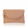 Nude-colored wallet with scalloped edge and gold charm on a white background
