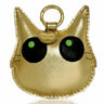 Gold cat-shaped keychain with green eyes on a white background