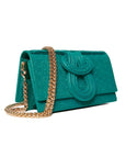 Teal handbag with gold chain on a white background
