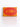 An orange leather tissue holder featuring a red scalloped oval patch with the text 'SHI' and 'K!' in orange, with a heart symbol replacing the 'I'.