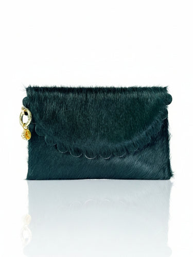 Dark green clutch with white base on a white background