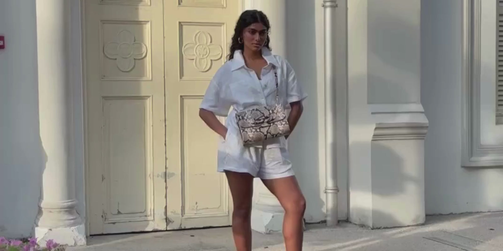 Elyse & i Theo Knot bag in monochrome snakeprint leather