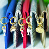 Colourful Bella purses with charms by Elyse & i
